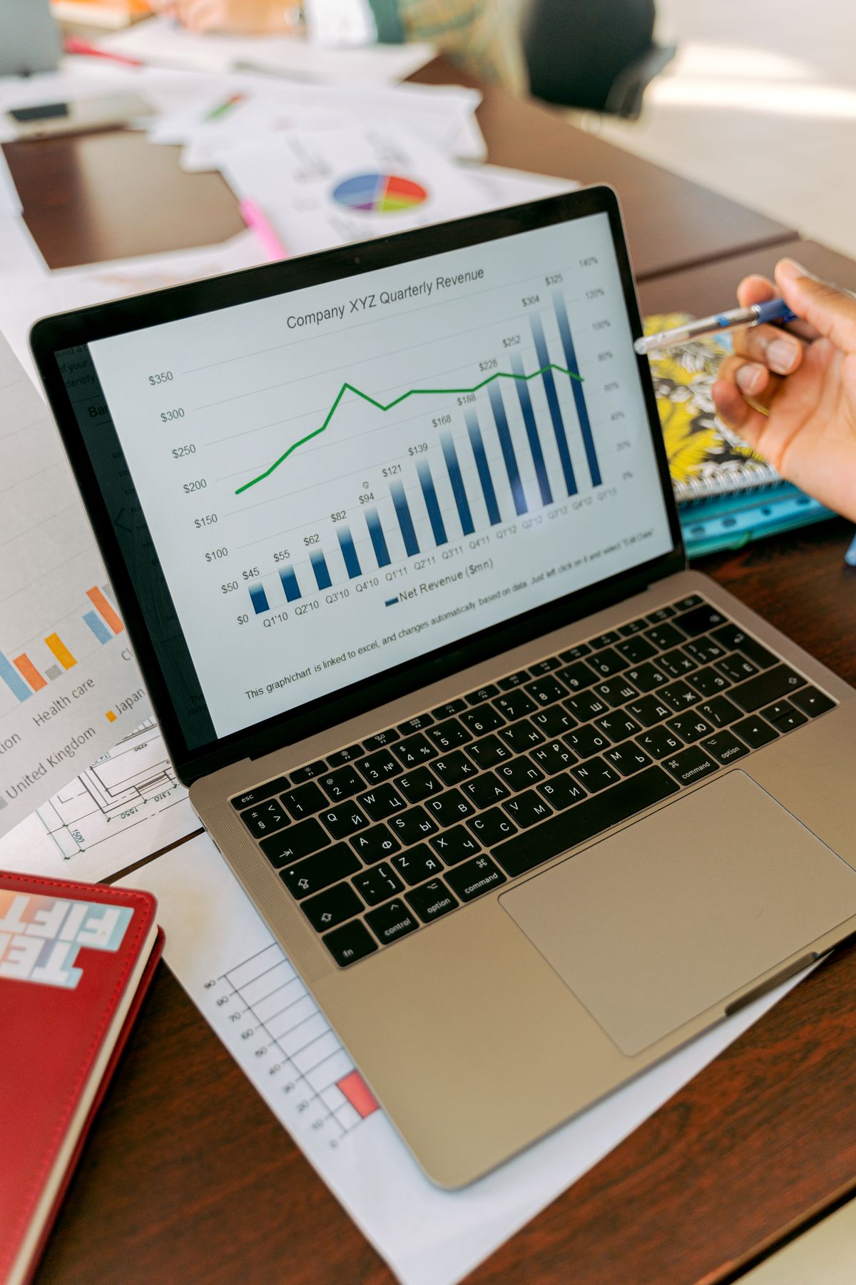 Monochrome photograph: An analytics dashboard displayed on a laptop.